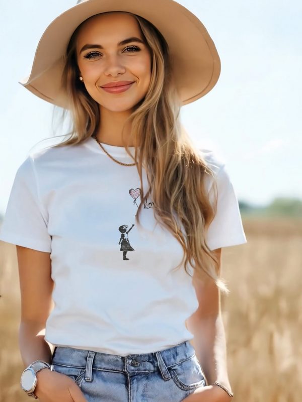 Damen T-Shirt aus schwarzer Bio-Baumwolle mit weißer Silhouette eines Mädchens und rotem Herzballon im Street-Art-Stil